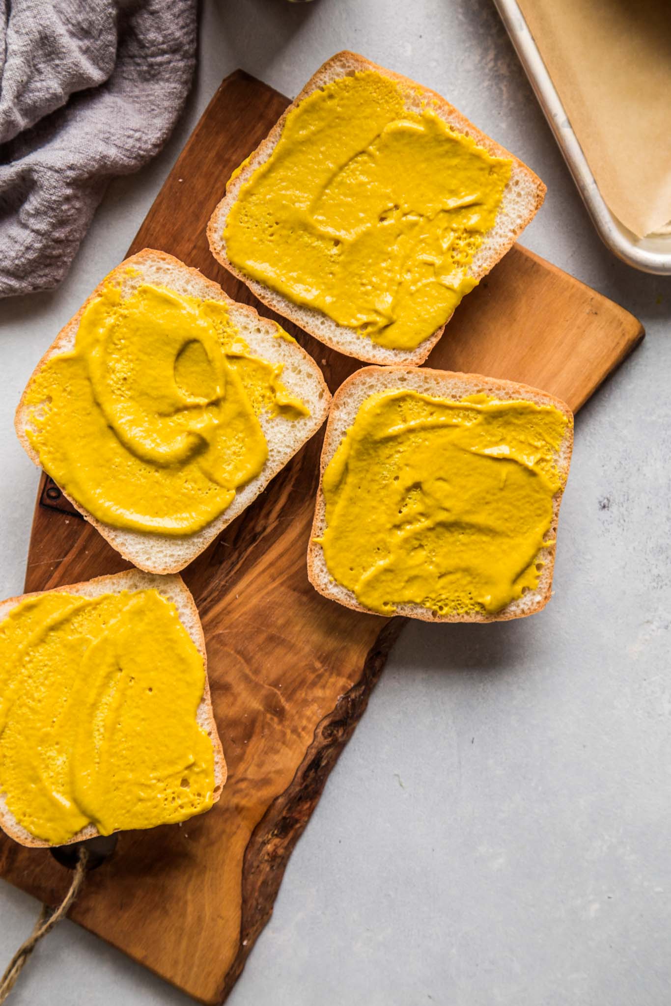 Rolls spread with mustard