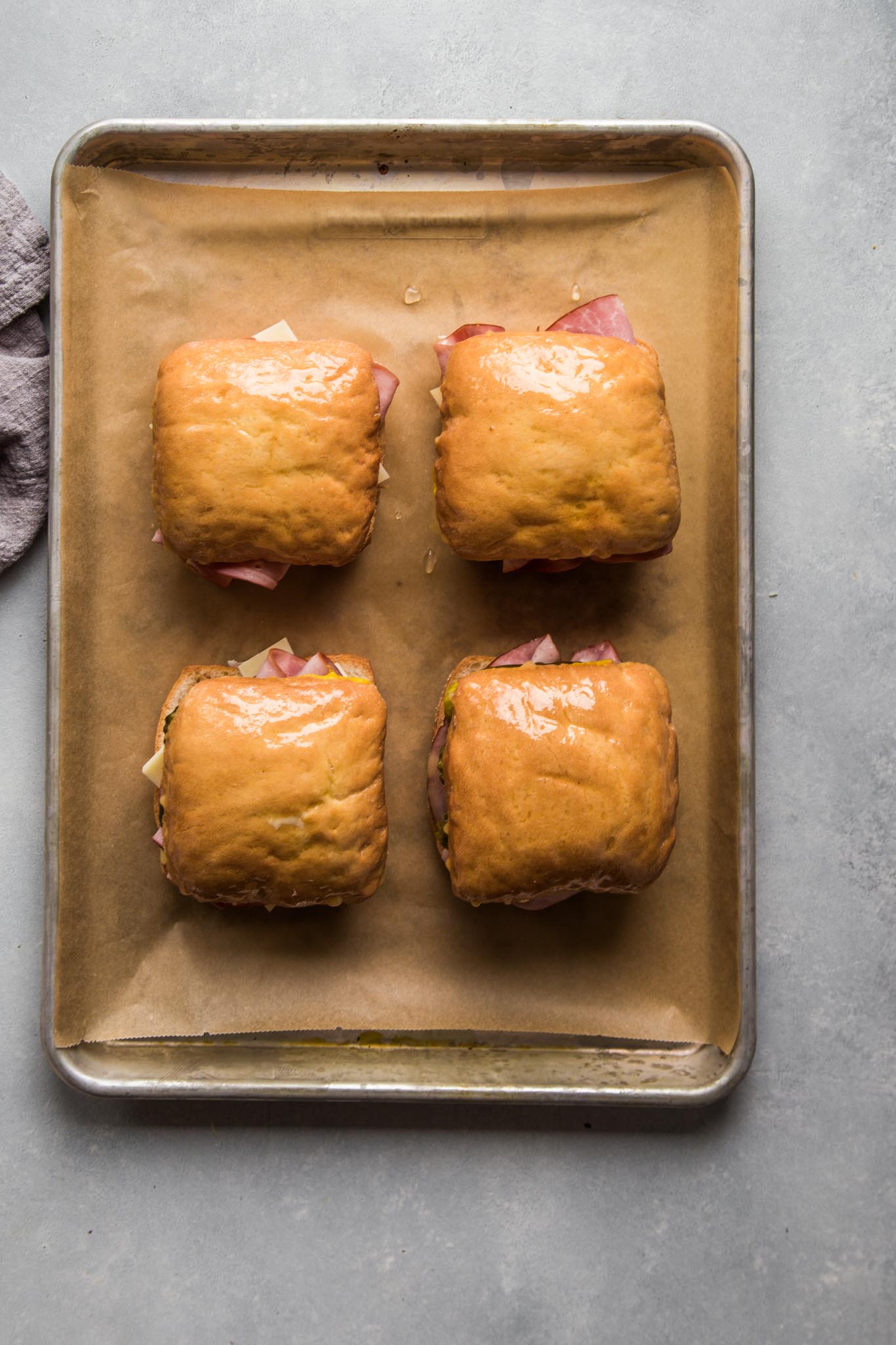 Overhead shot of cubano sandwiches ready for baking.