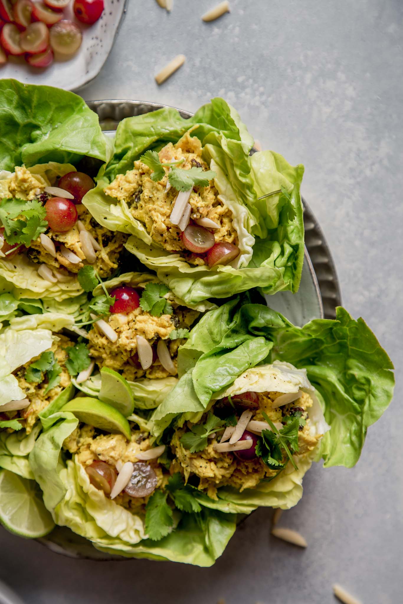 Platter of chicken curry salad lettuce wraps.