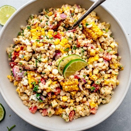 Overhead shot of Mexican street corn salad in serving bowl.