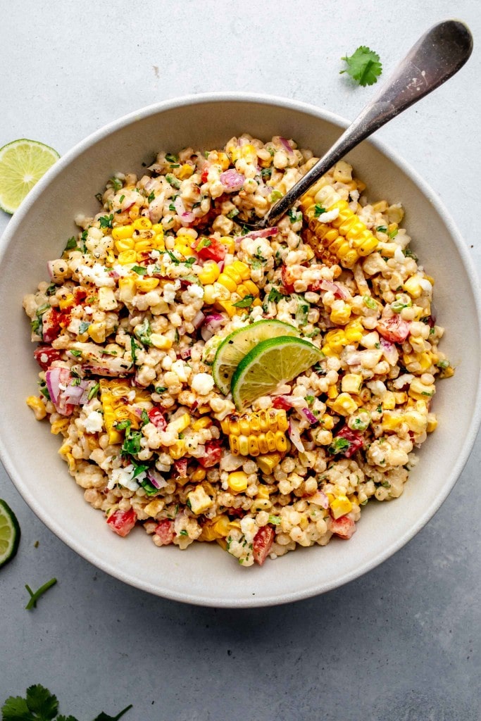 Overhead shot of Mexican street corn salad in serving bowl.