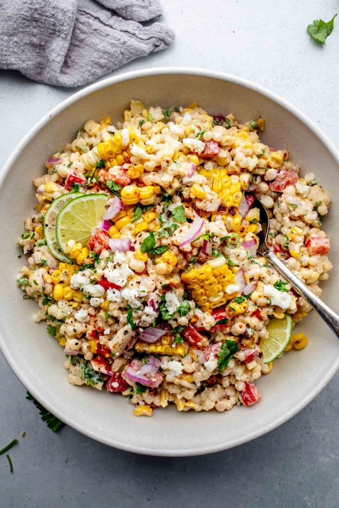 Overhead shot of Mexican street corn salad in serving bowl.