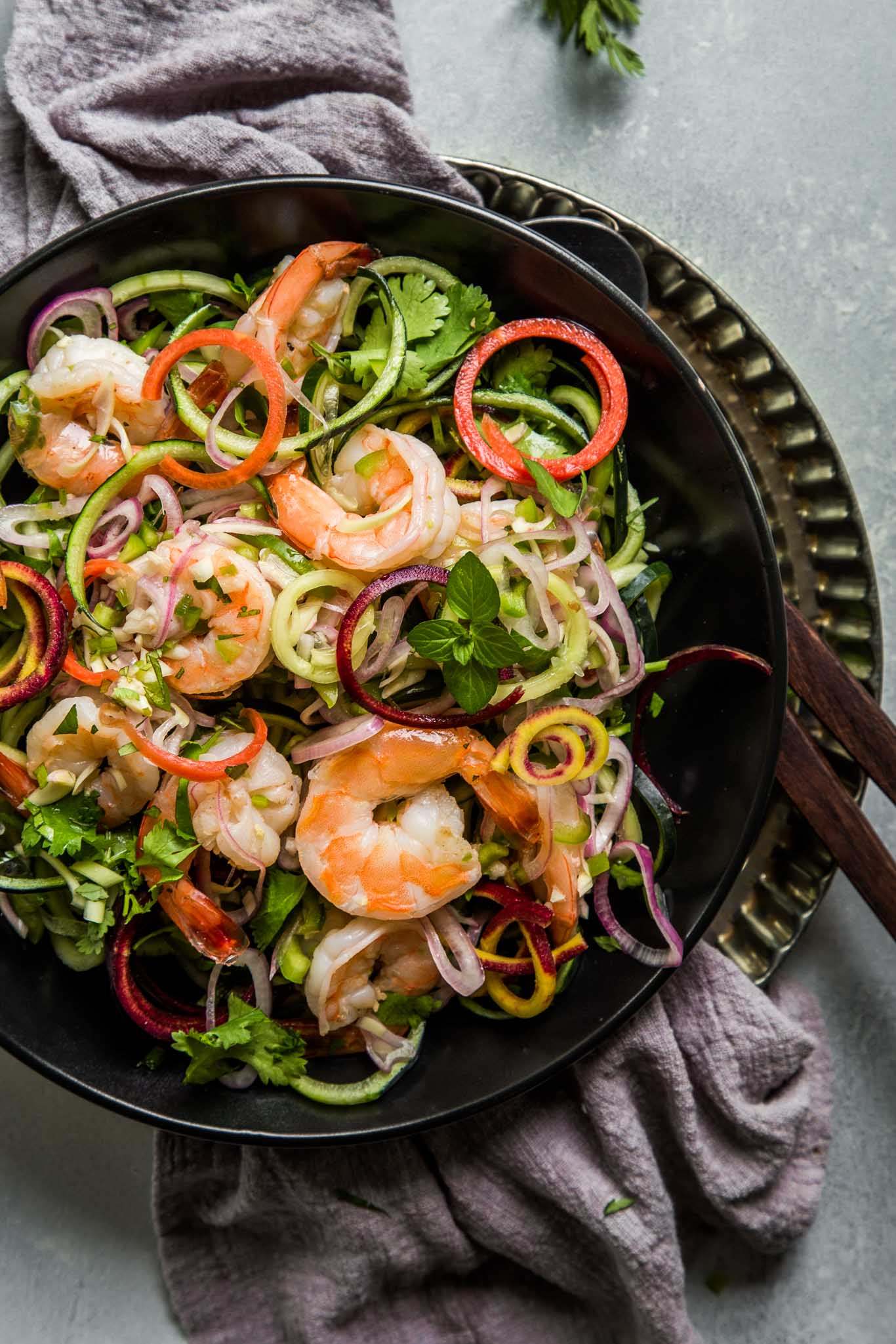 Thai shrimp salad served in a black dish
