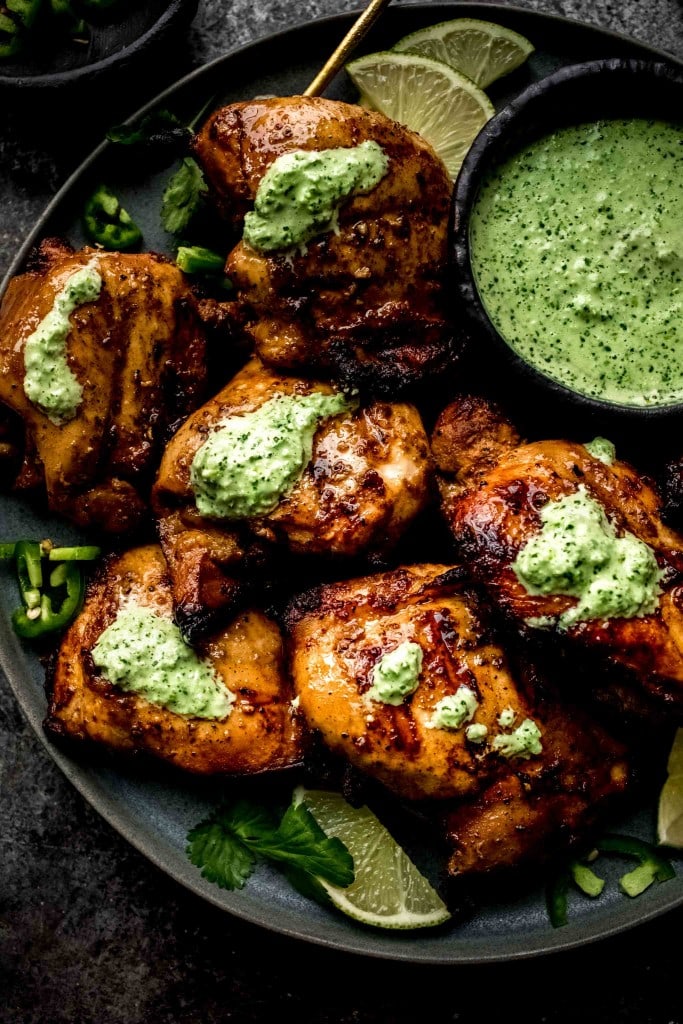 Peruvian chicken arranged on plate. 