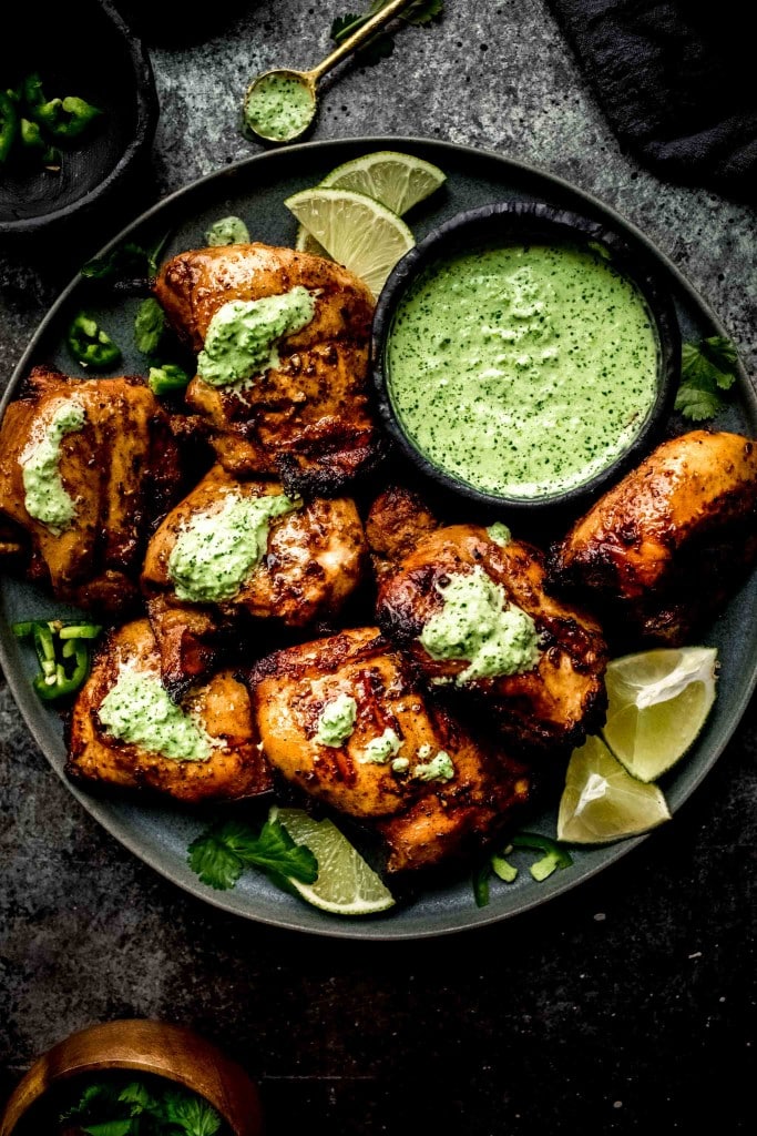 PLATE OF PERUVIAN CHICKEN DRIZZLED WITH AJI VERDE. 