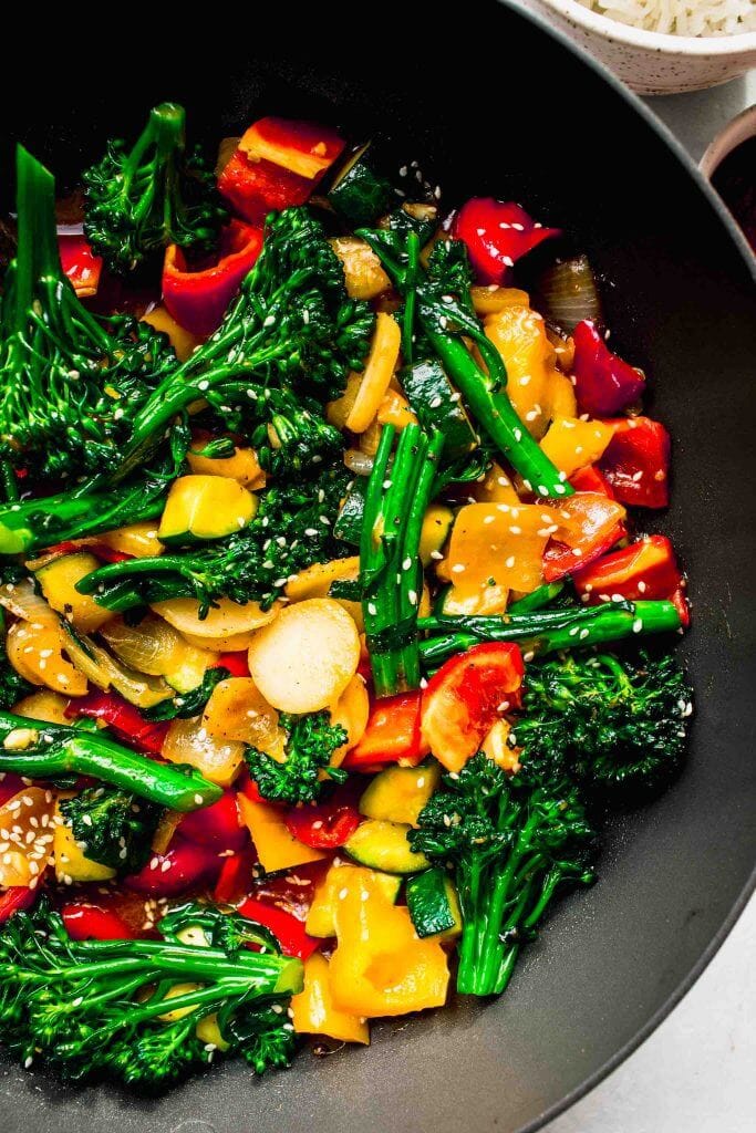 Close up of veggie stir fry in wok.