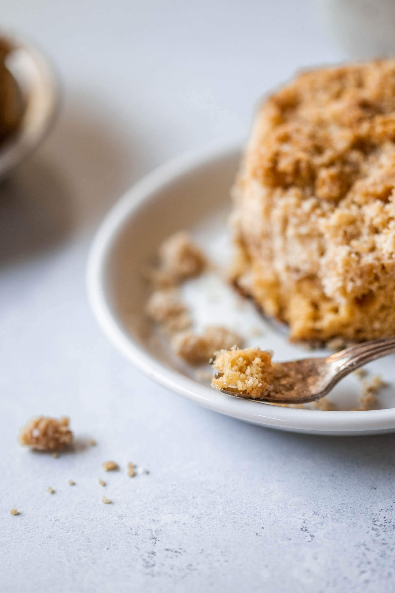 Chai spiced crumb cake on a fork.