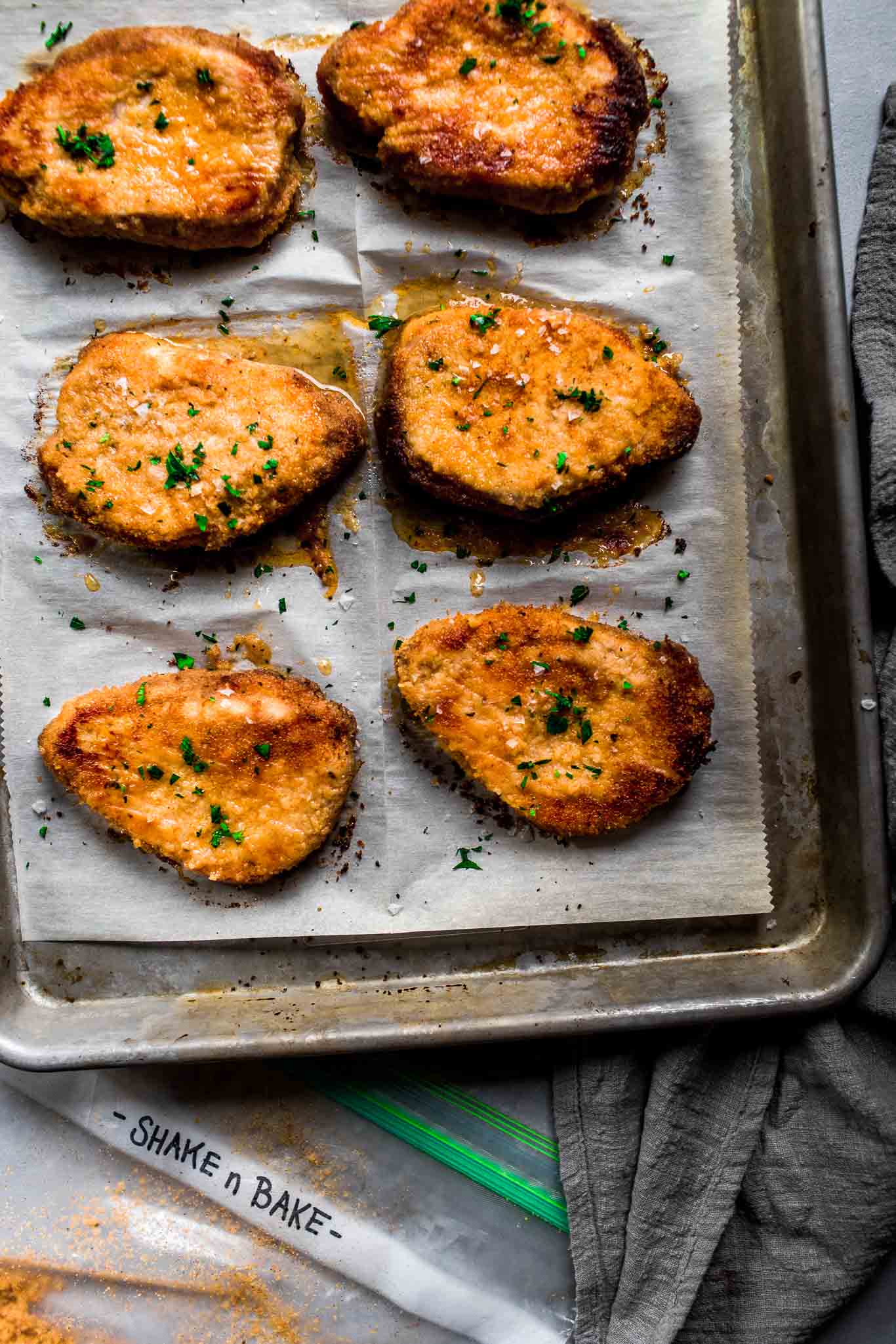 Shake N Bake Pork Chops on Baking Sheet. 