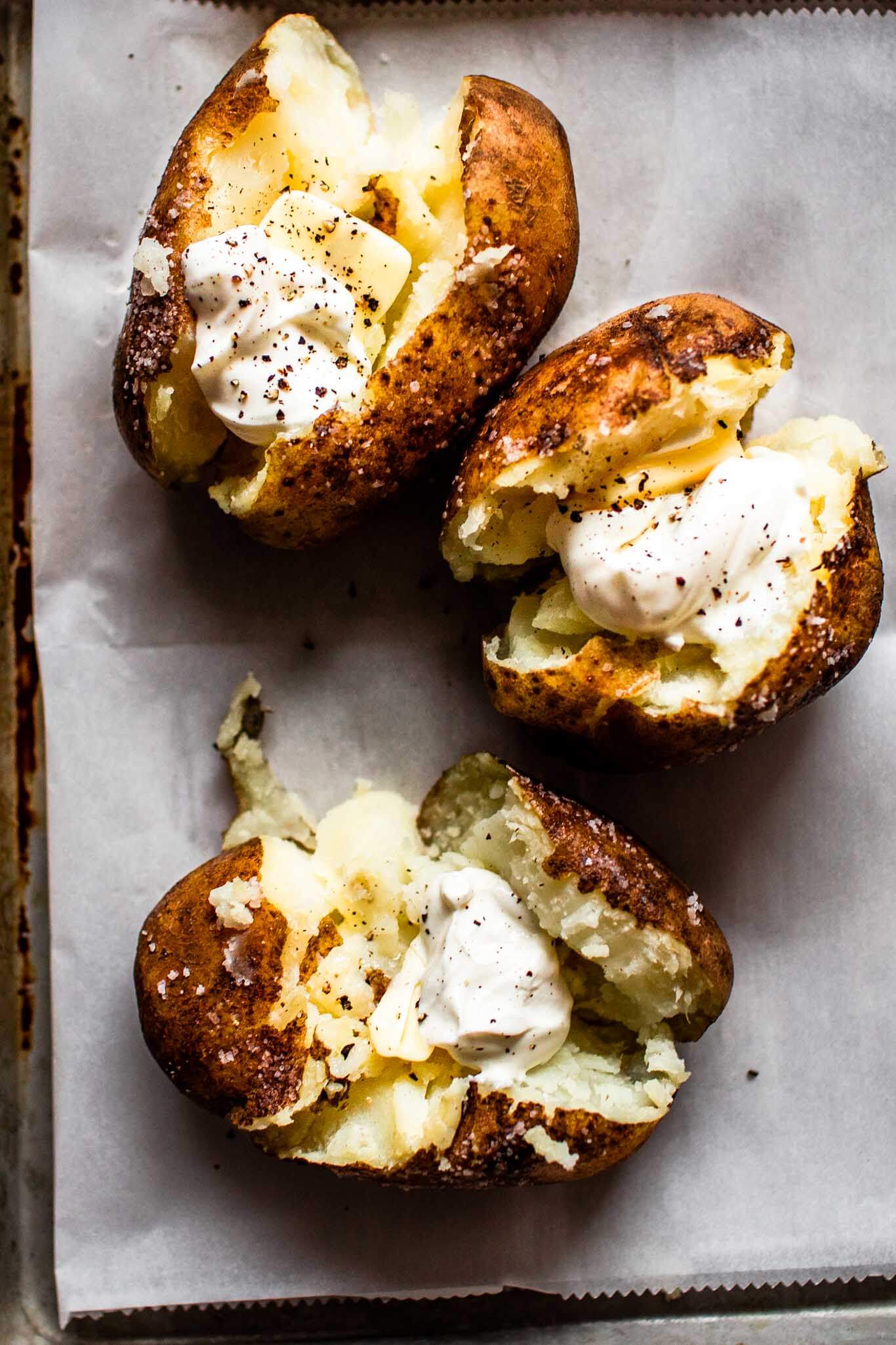 Overhead shot of baked potatoes.