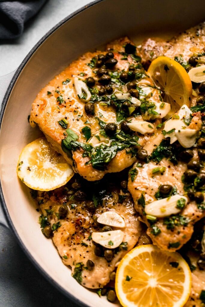 Pork piccata in skillet. 