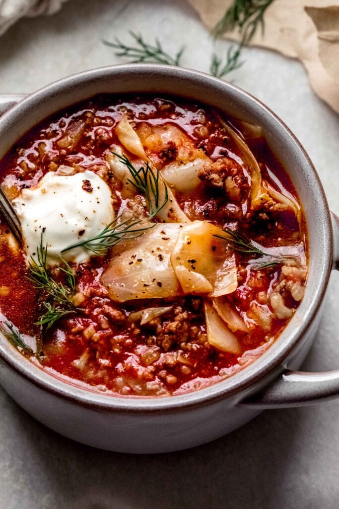 Overhead close up of bowl of unstuffed cabbage roll soup.