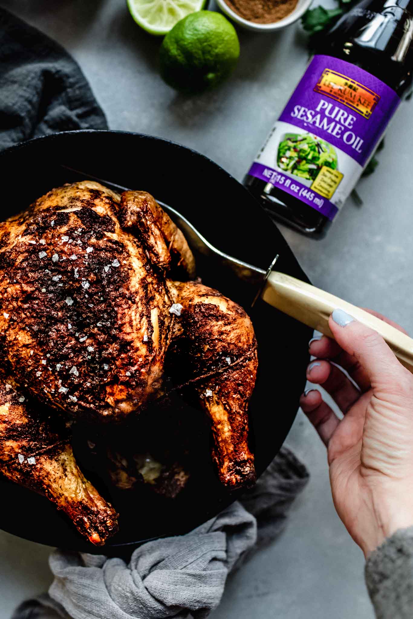 Overhead shot of chicken in cast iron skillet.