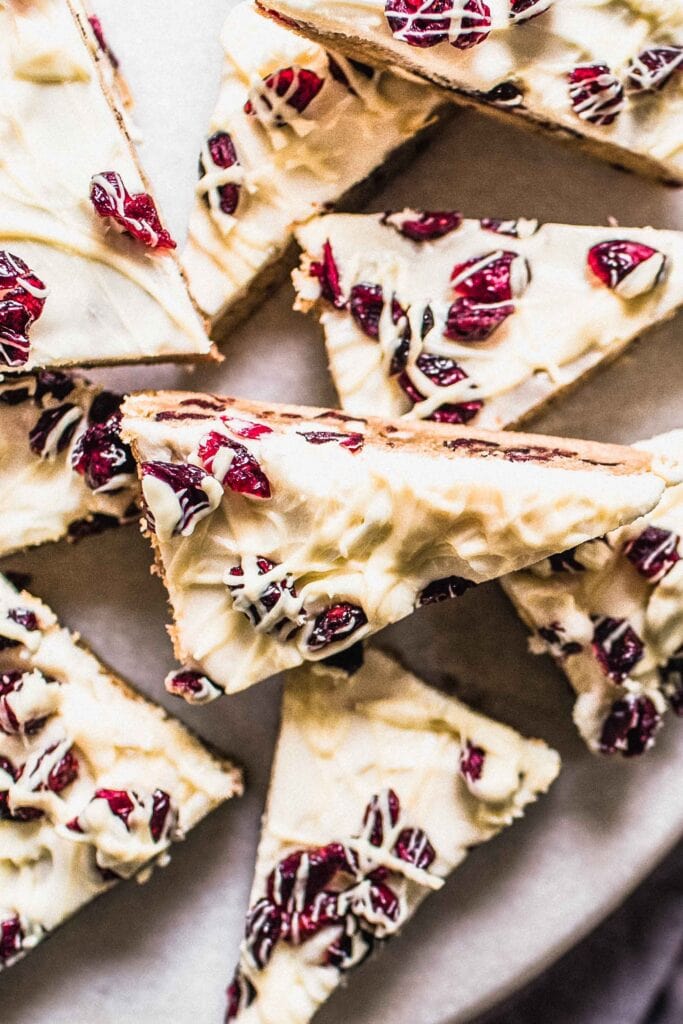 Close up of cranberry bliss bars on serving tray. 