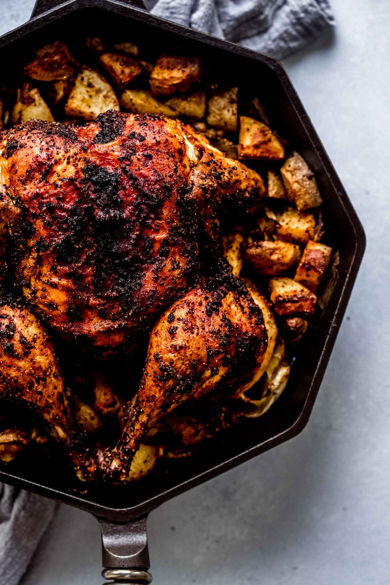 Cooked chicken in skillet.