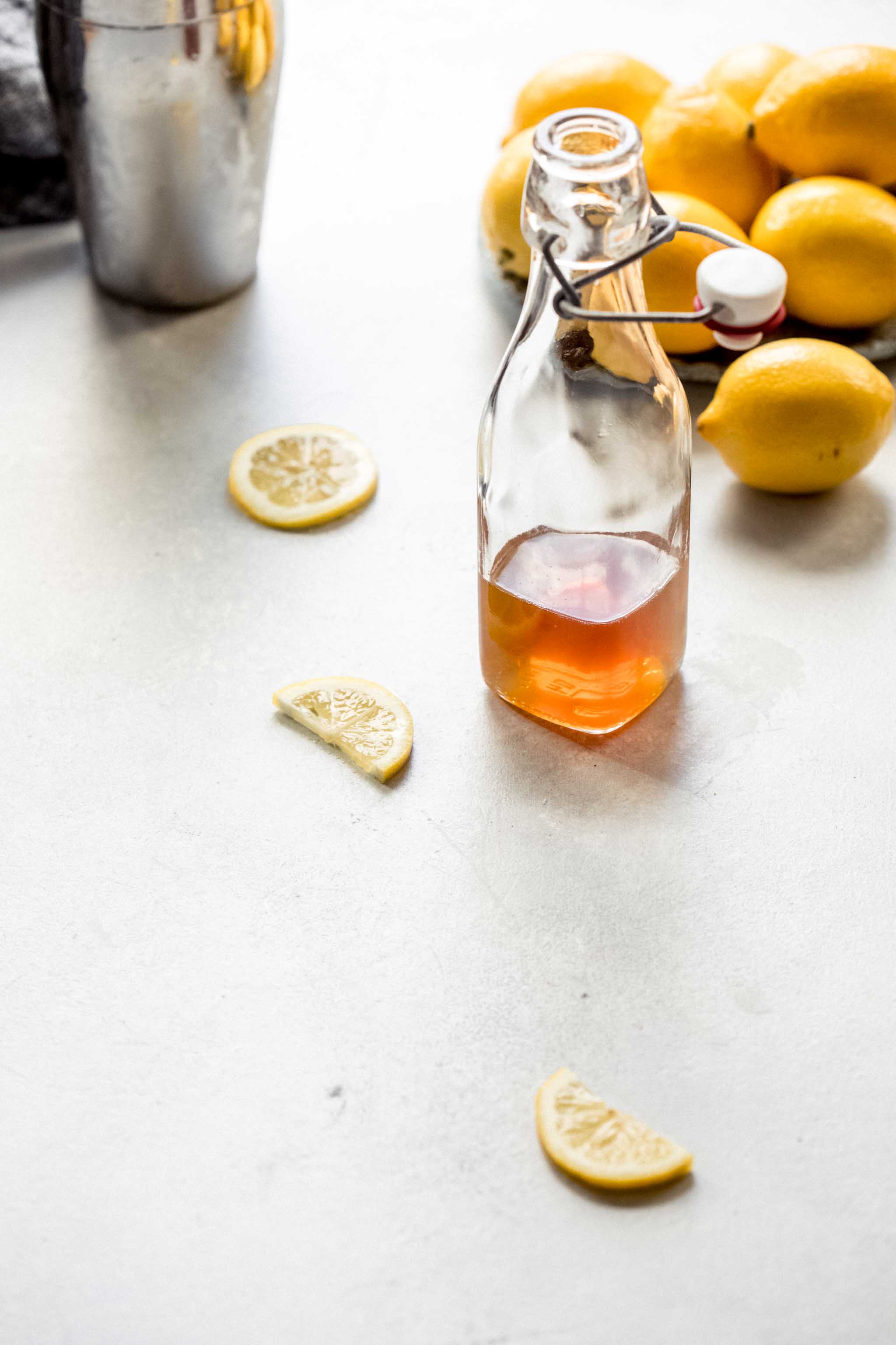 Honey simple syrup in glass bottle.