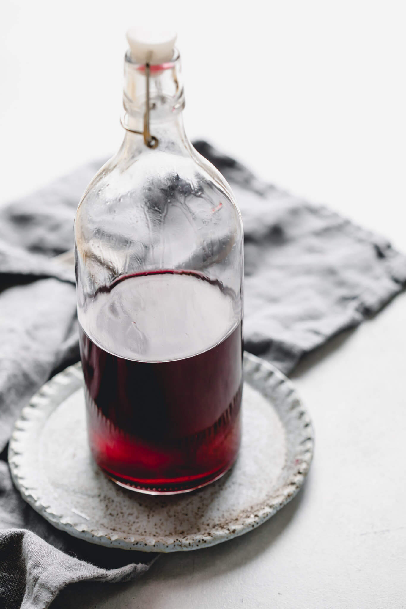 Bottle of blackberry sous vide infused vodka.