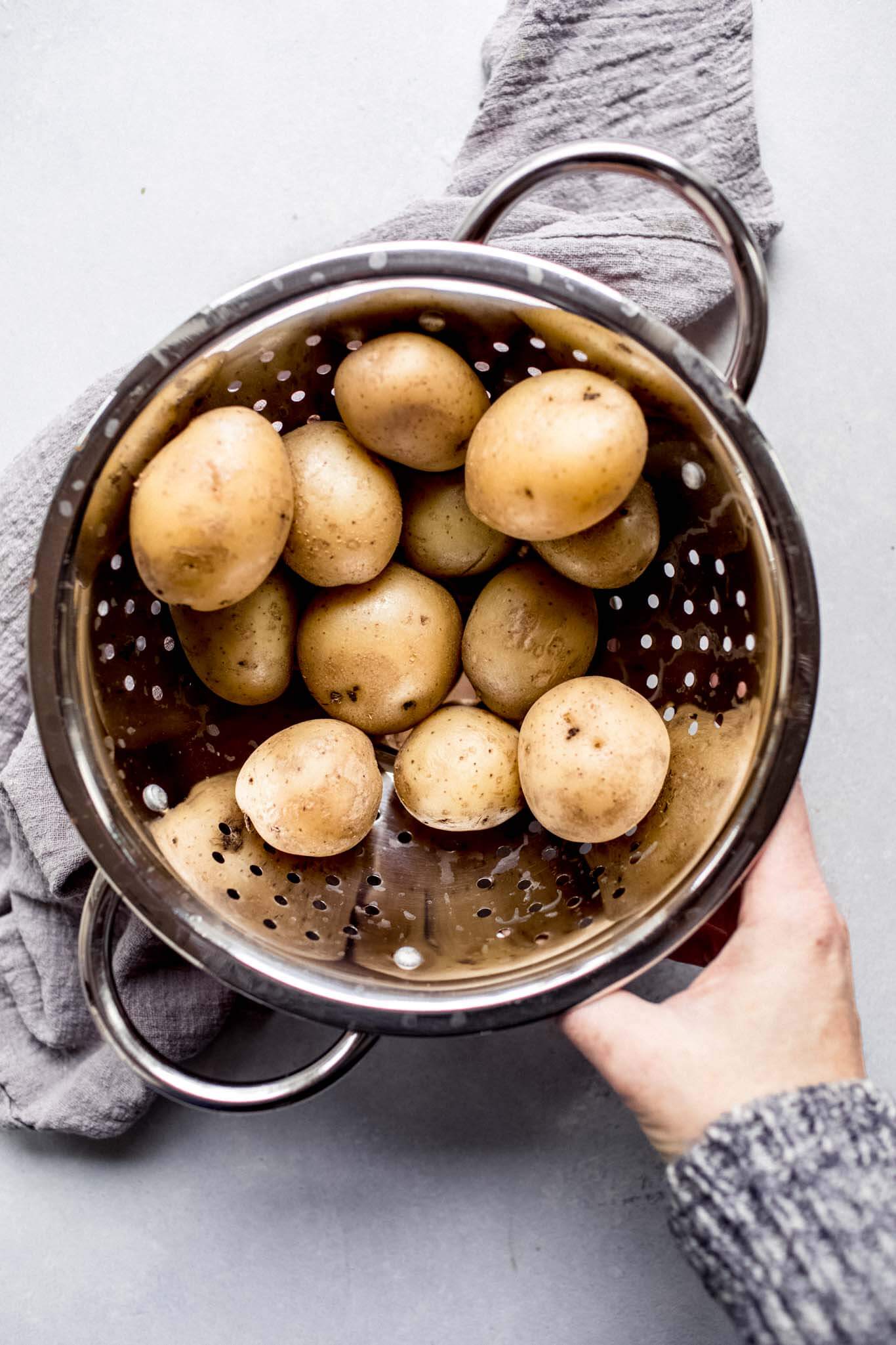 Baby potatoes in colander.