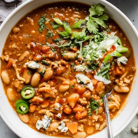 Overhead shot of bowl of buffalo chicken chili.