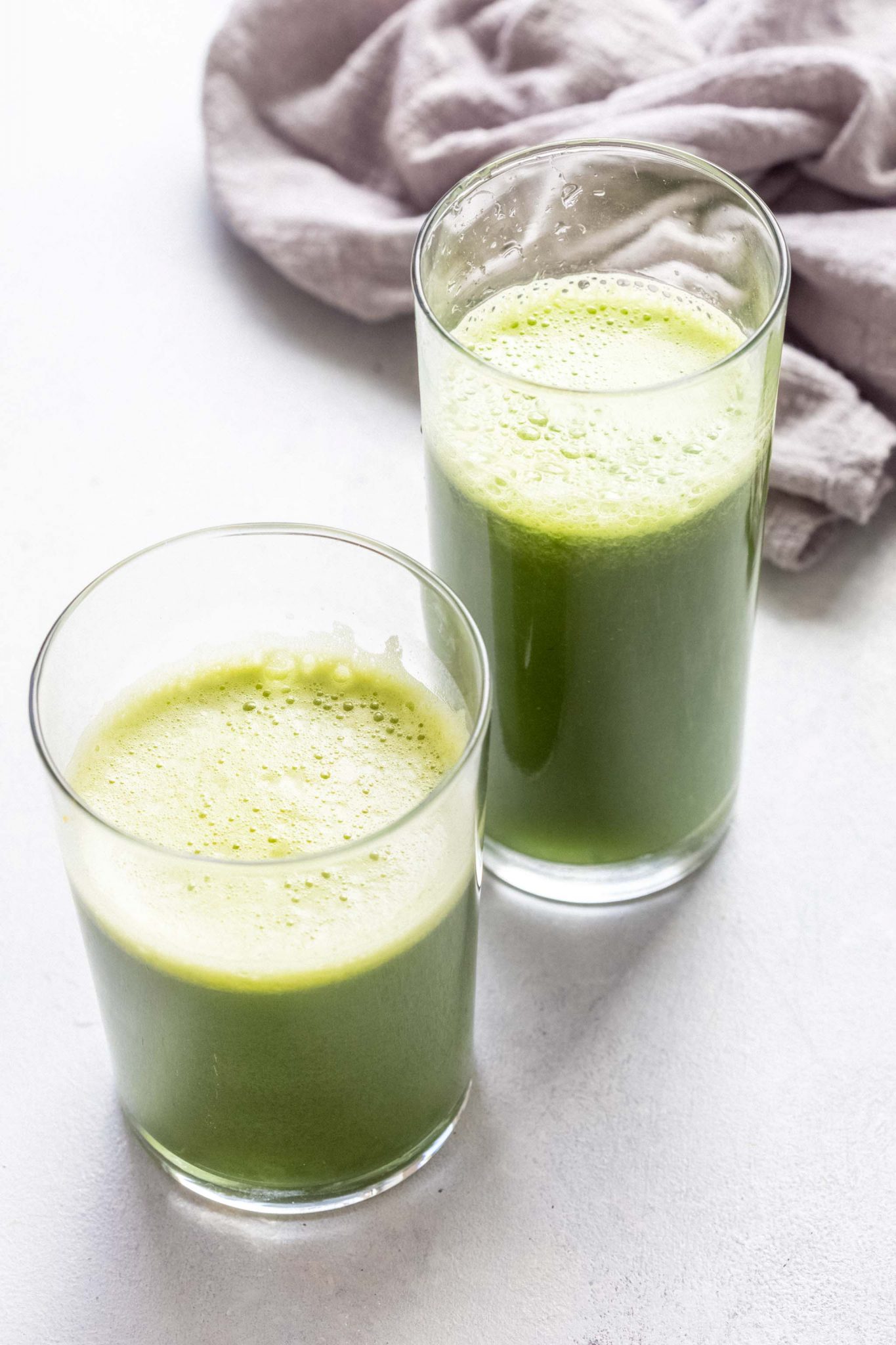 Green juices in two glasses.