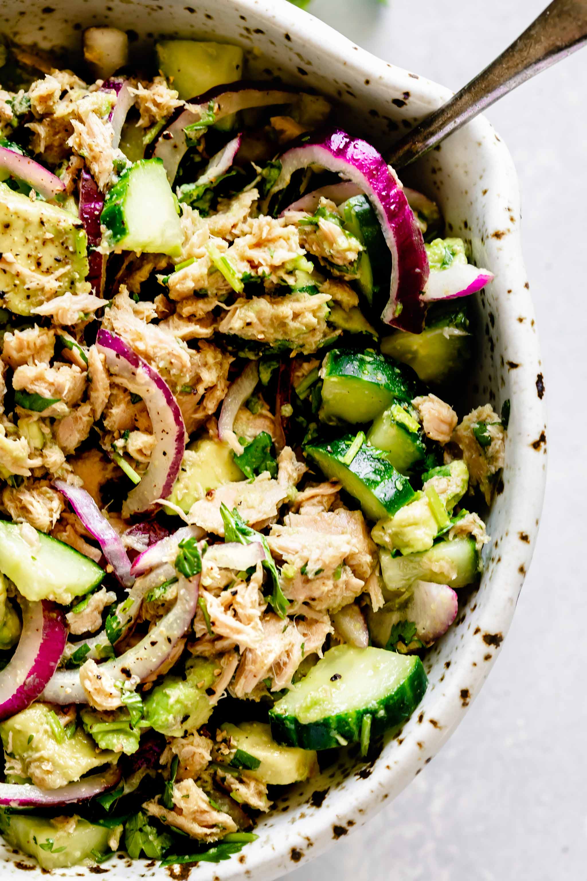 Overhead close up of bowl of prepared tuna salad. 