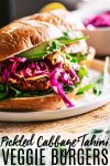 These Plant Based Burgers with Pickled Cabbage & Tahini Sauce are full of flavor & plant protein! Perfect for the grilling season!! // veggie burgers // burger recipe