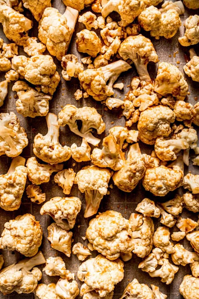 Cauliflower spread on baking sheet.