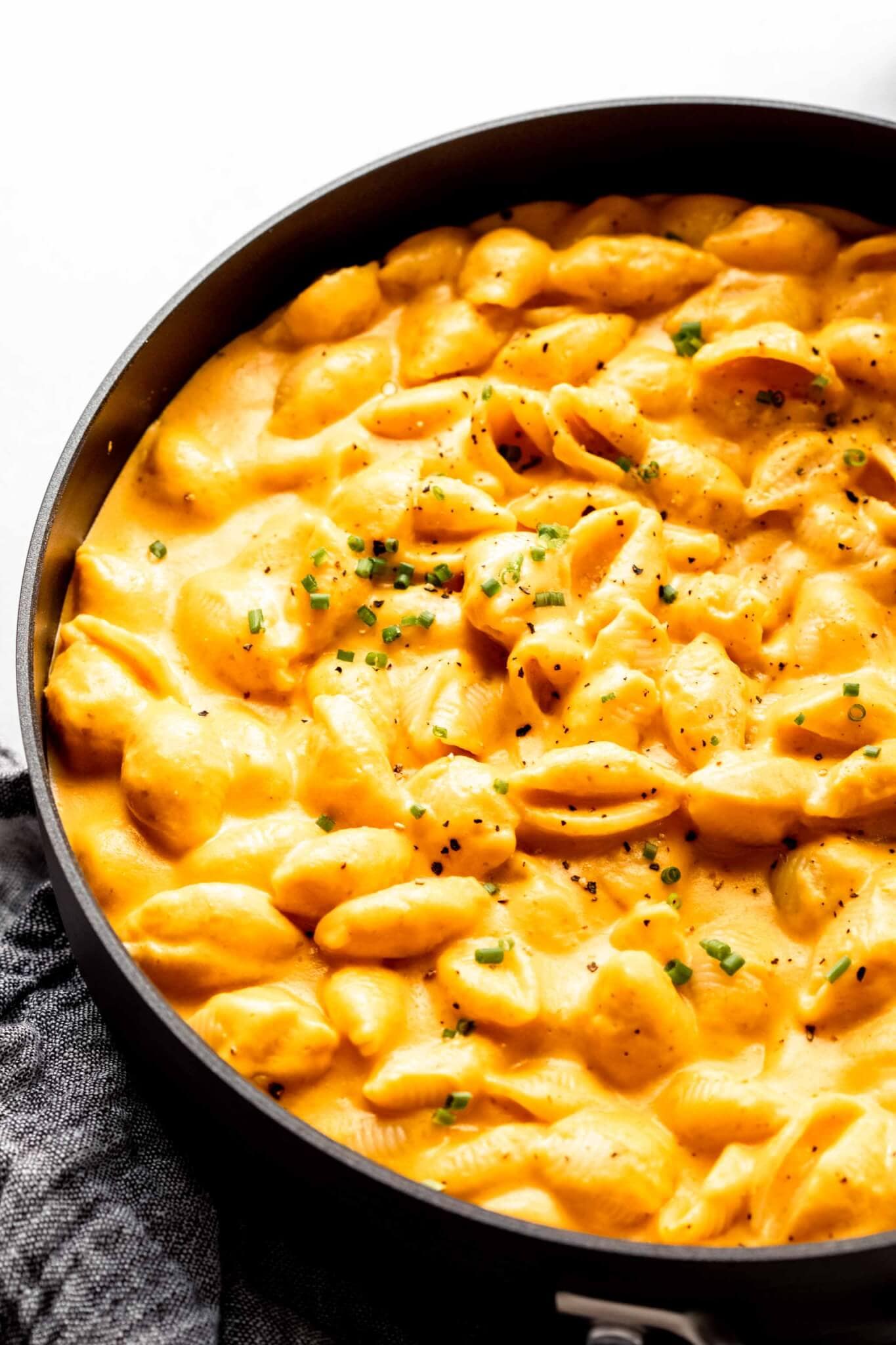 Side view of pumpkin mac & cheese in skillet.