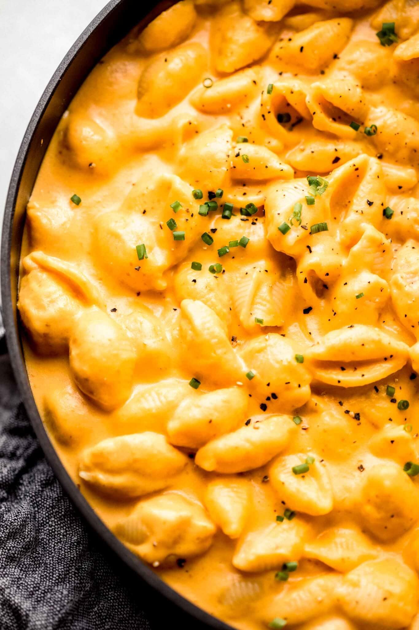 Overhead close up of pumpkin mac & cheese in skillet.