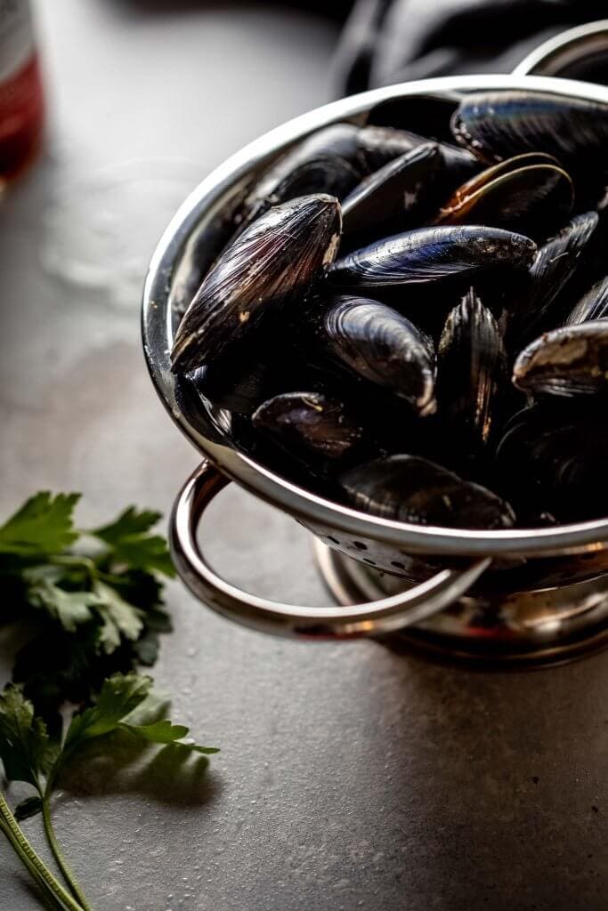 Mussels in collander. 