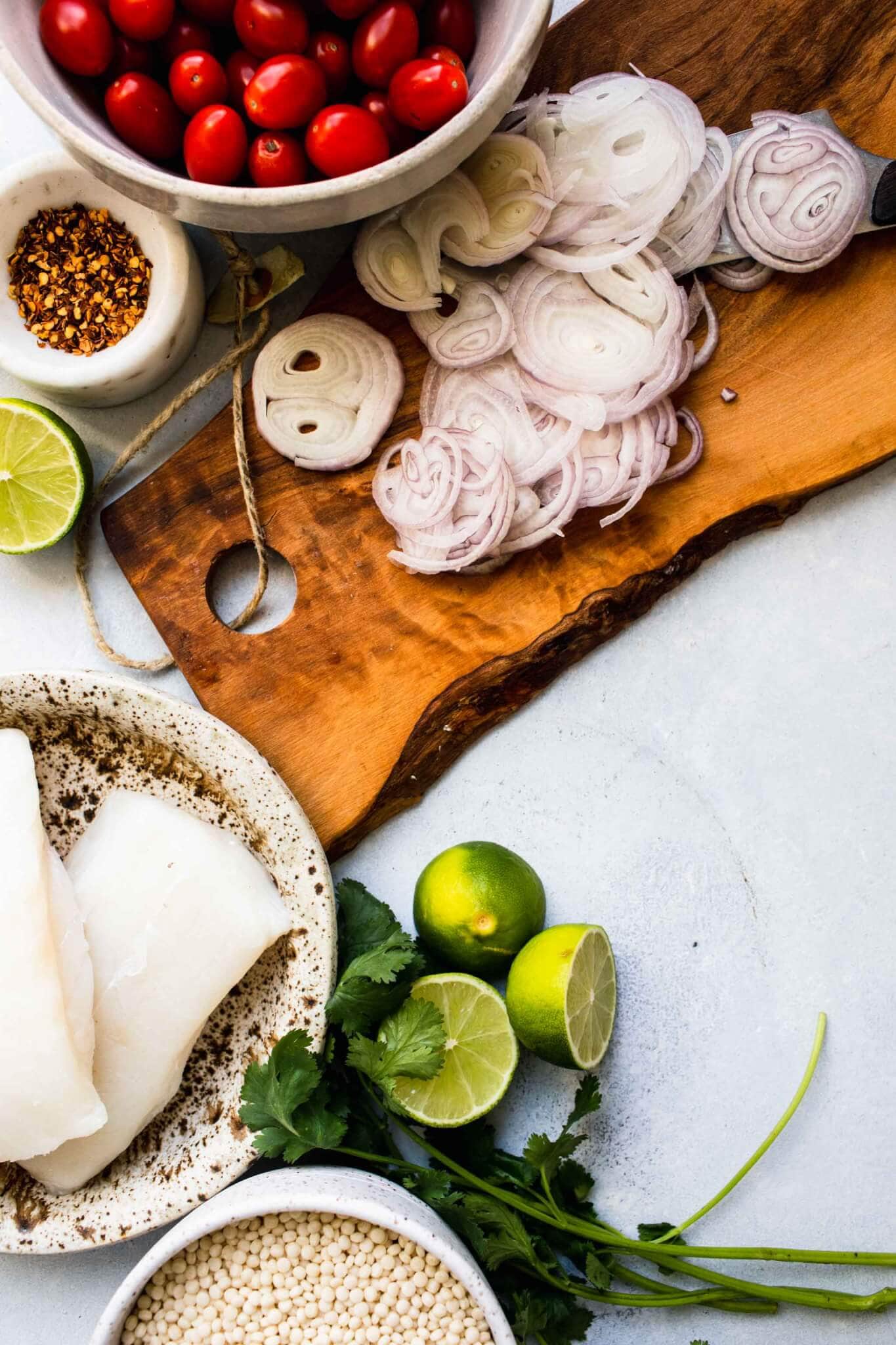 Tomato Poached Fish with Crispy Shallots + Chili