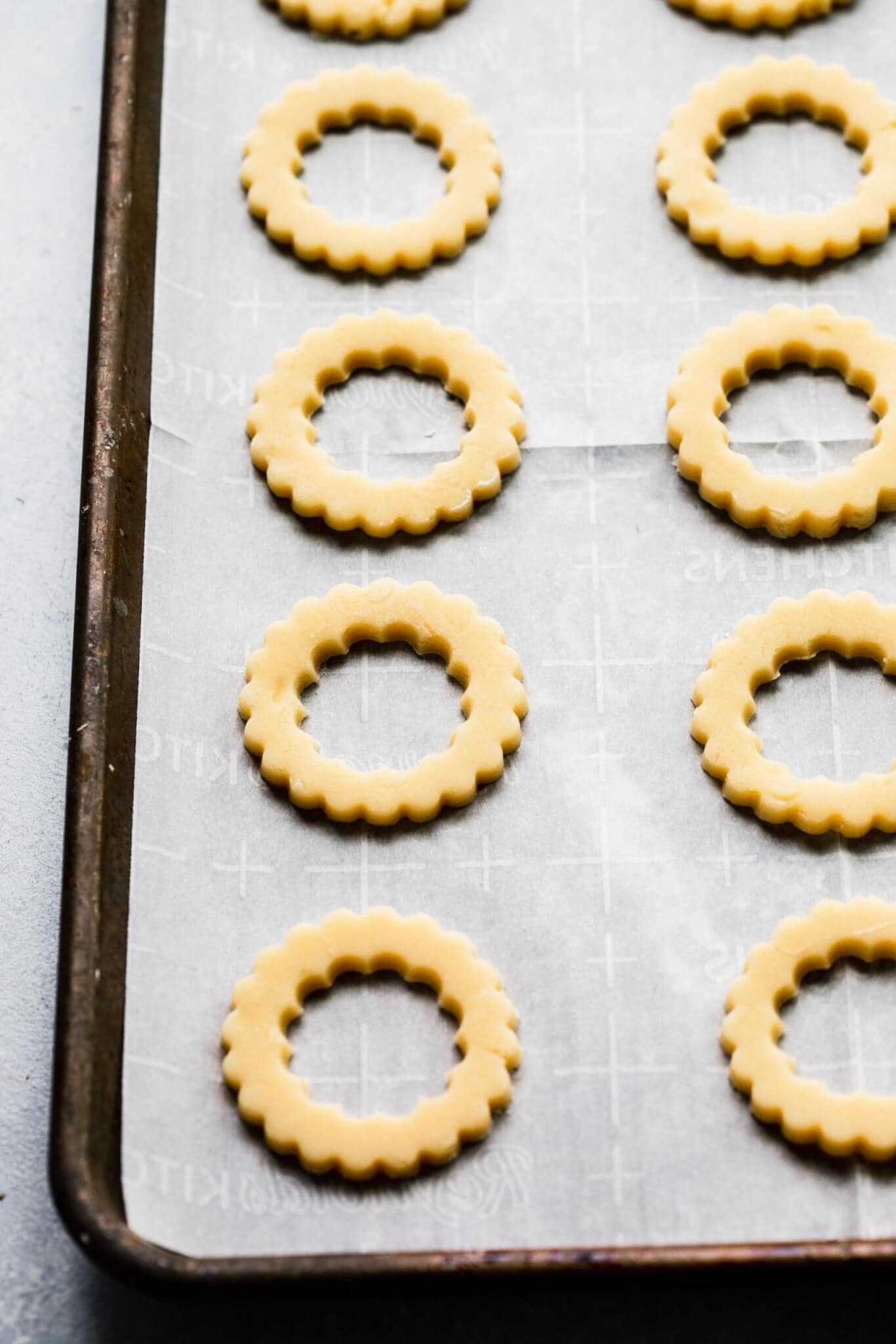 Cut out cookie shapes on baking sheets before going in oven.