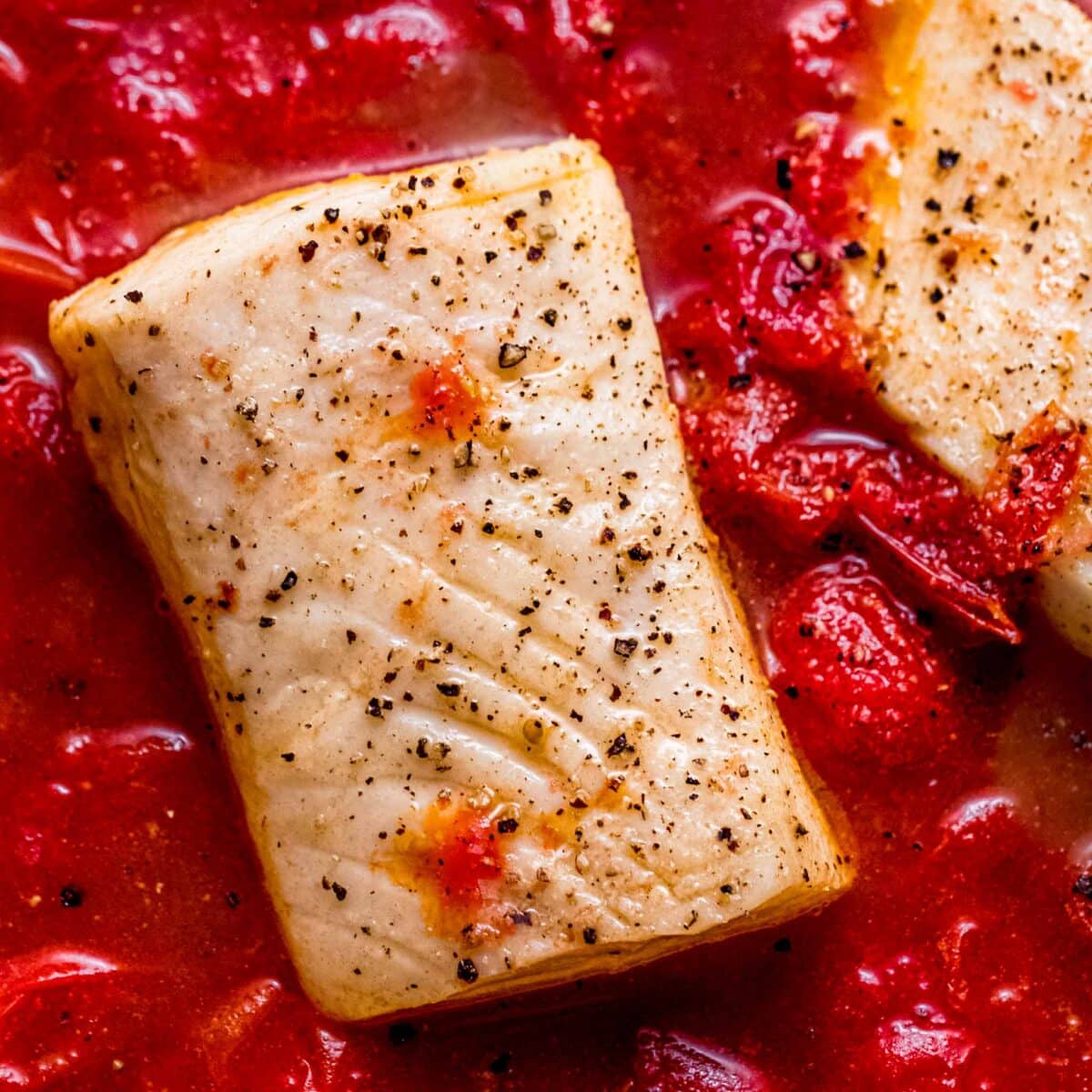 Tomato Poached Fish with Chile Oil + Herbs
