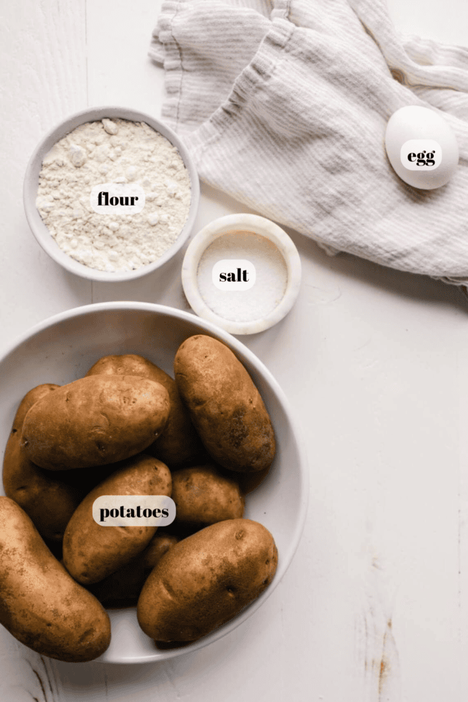 INGREDIENTS FOR HOMEMADE GNOCCHI LABELED ON COUNTER. 