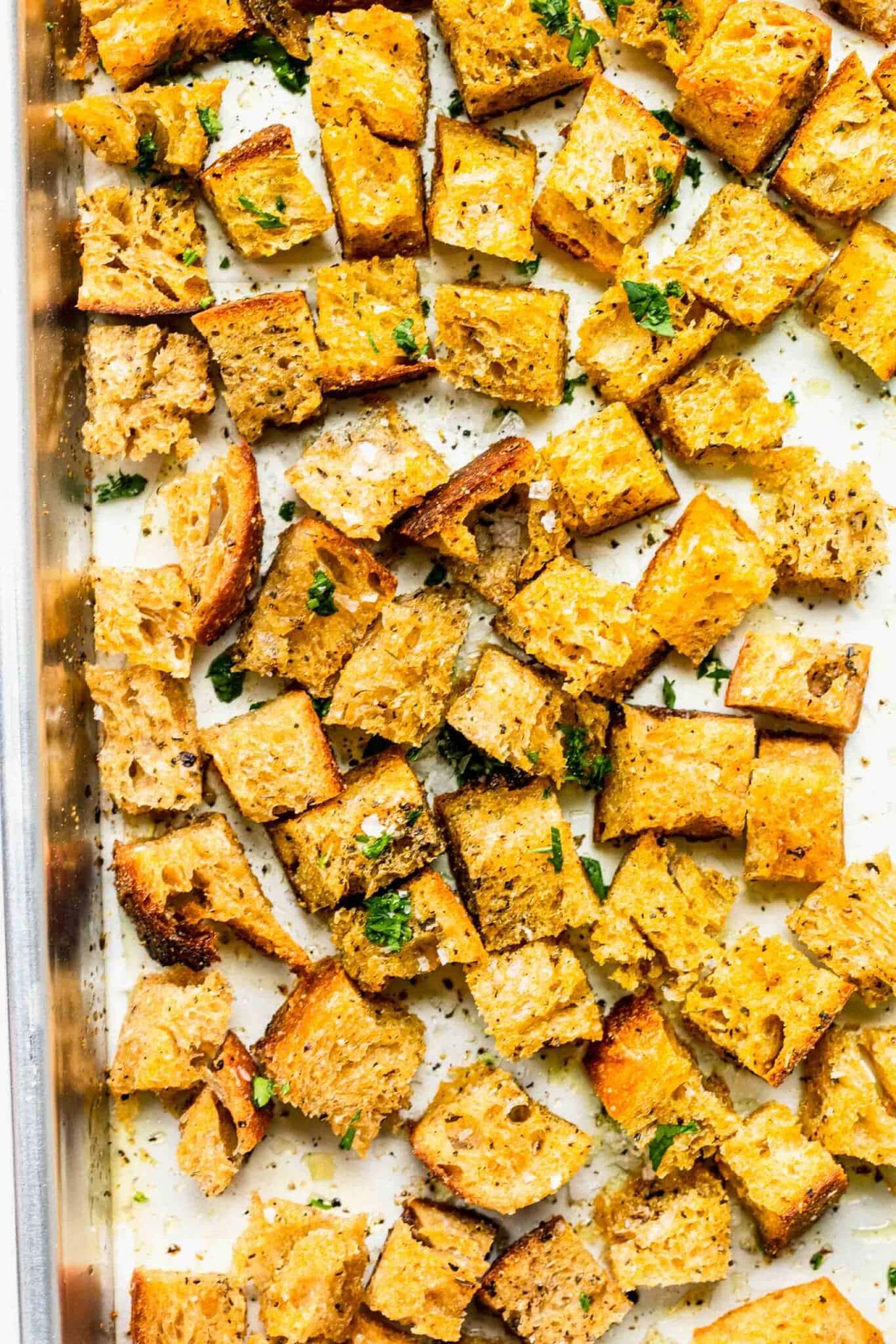 Croutons on baking sheet after cooking.