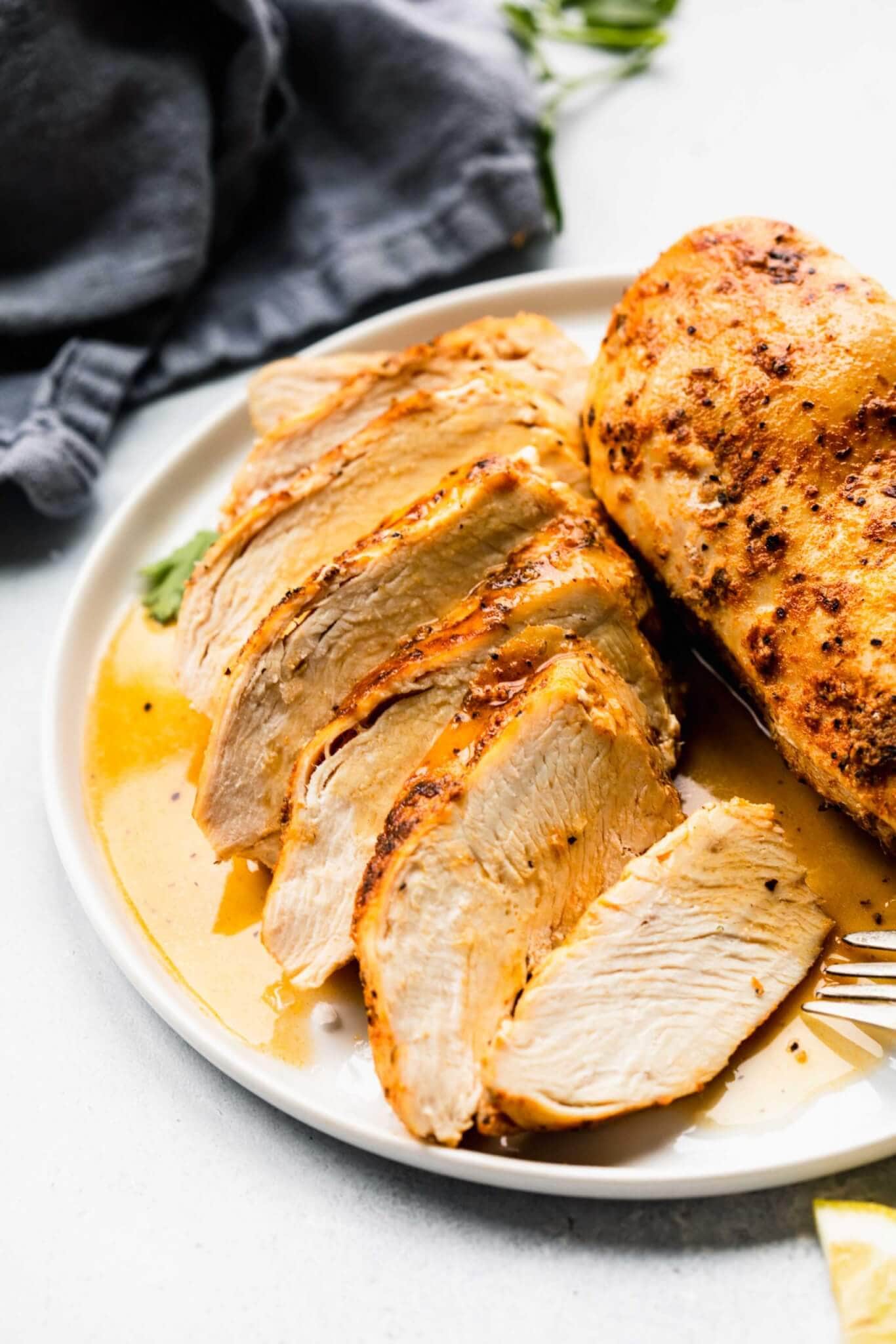 Side view of sliced instant pot chicken breast.