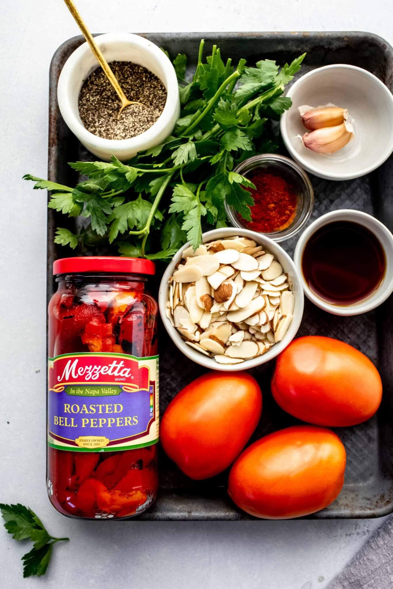 Ingredients for romesco sauce laid out on tray.