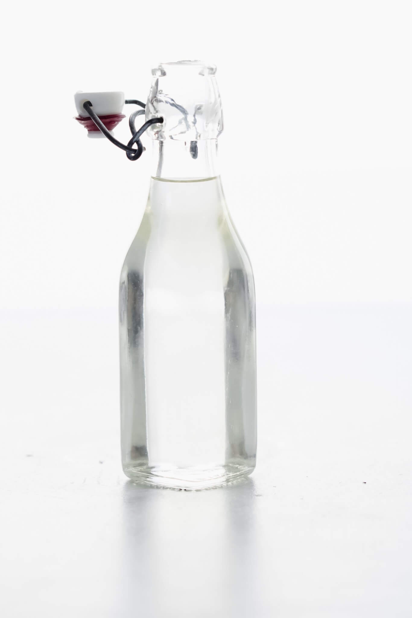 Side view of bottle of prepared simple syrup.