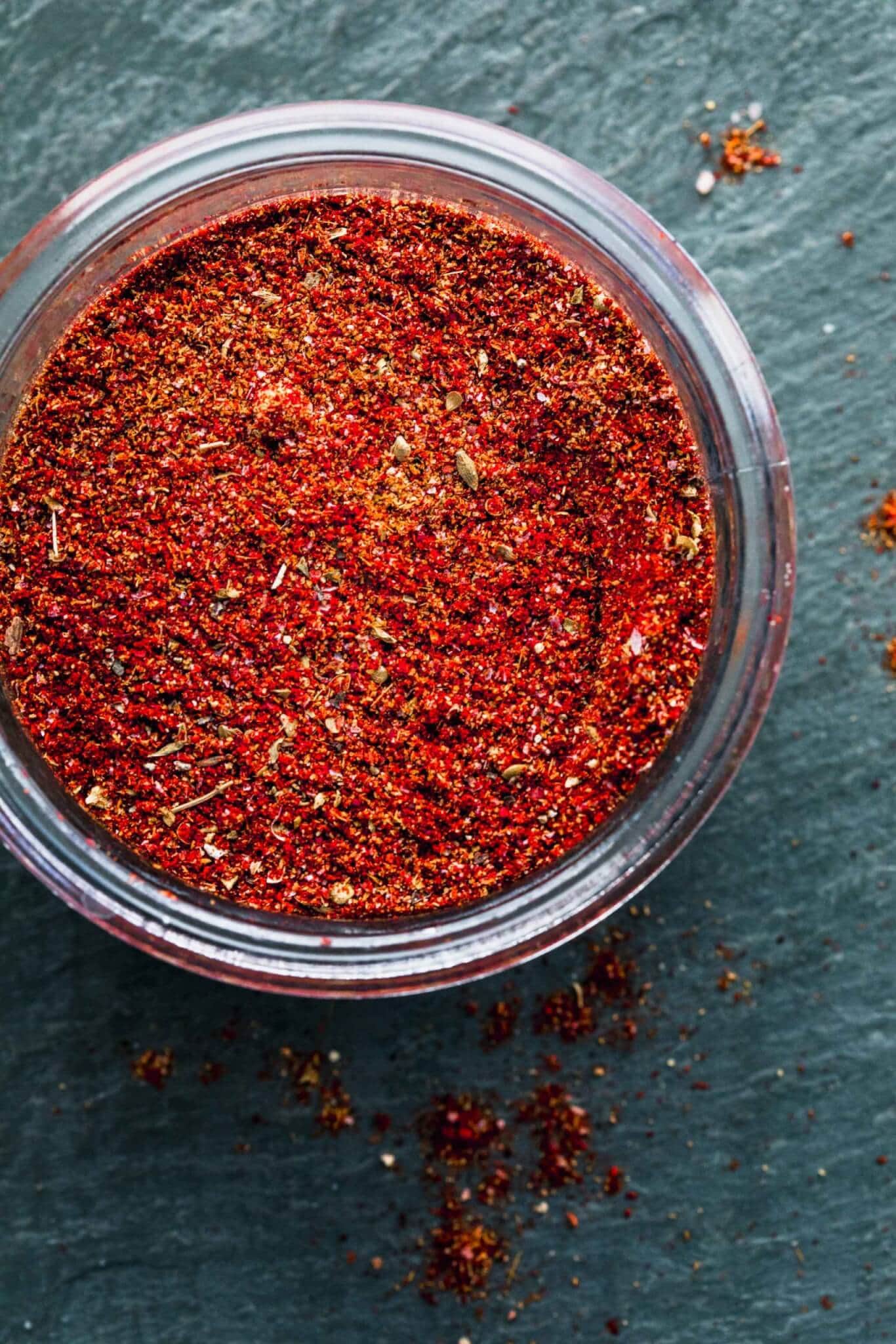 OVERHEAD SHOT OF TACO SEASONING IN GLASS CONTAINER
