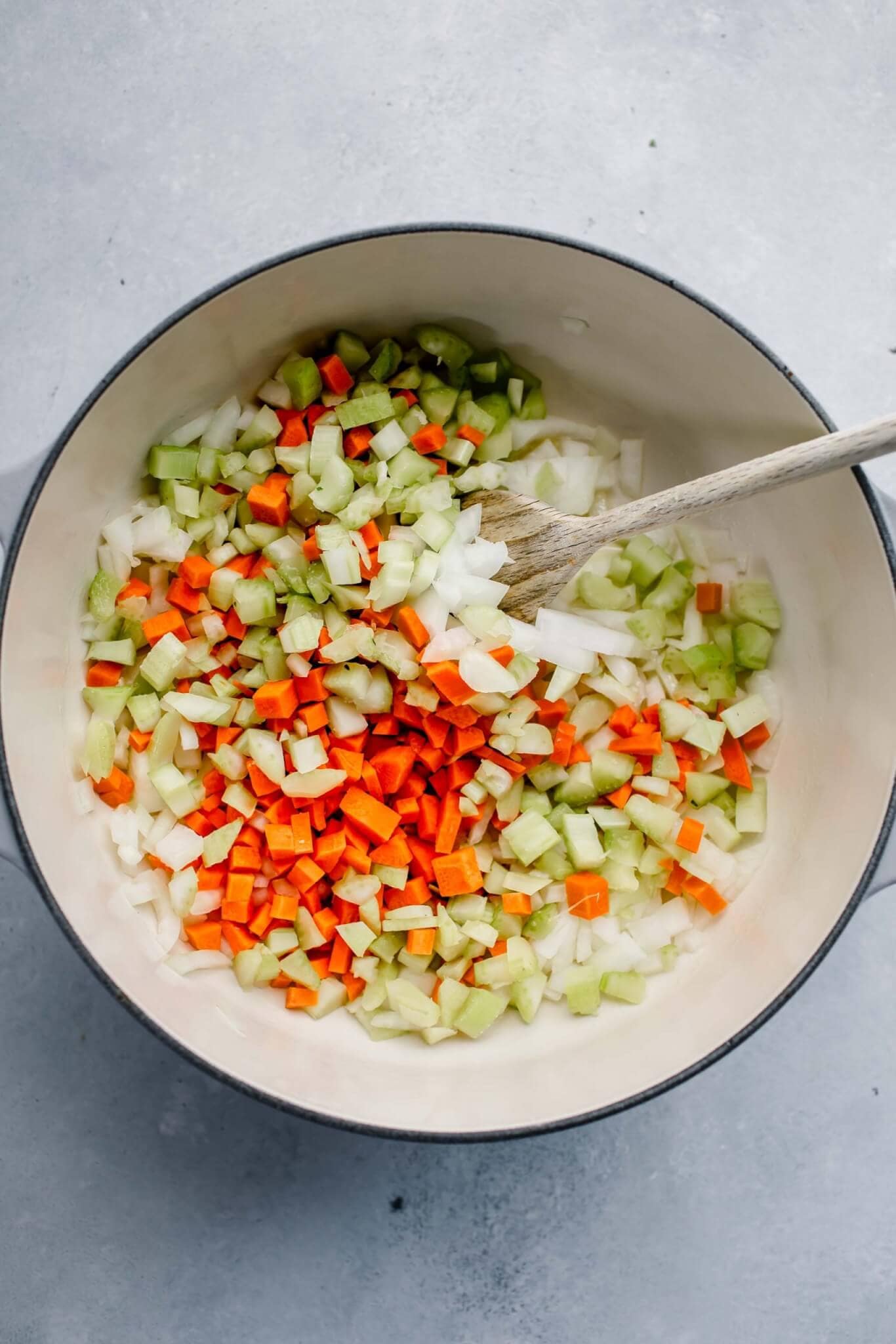Celery, carrots and onions in saute pan