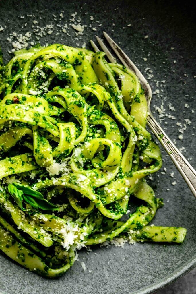 Pesto swirled with fettuccini noodles. 