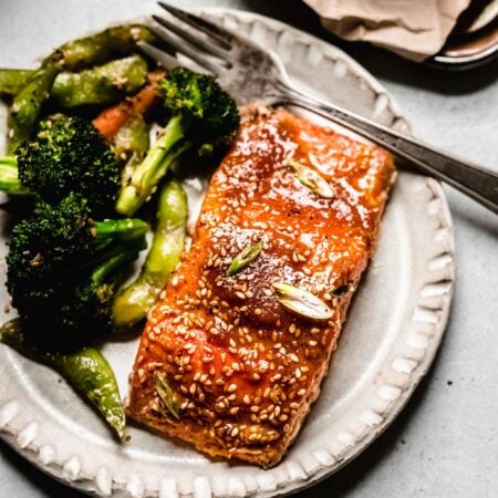 Close up of miso salmon on plate.