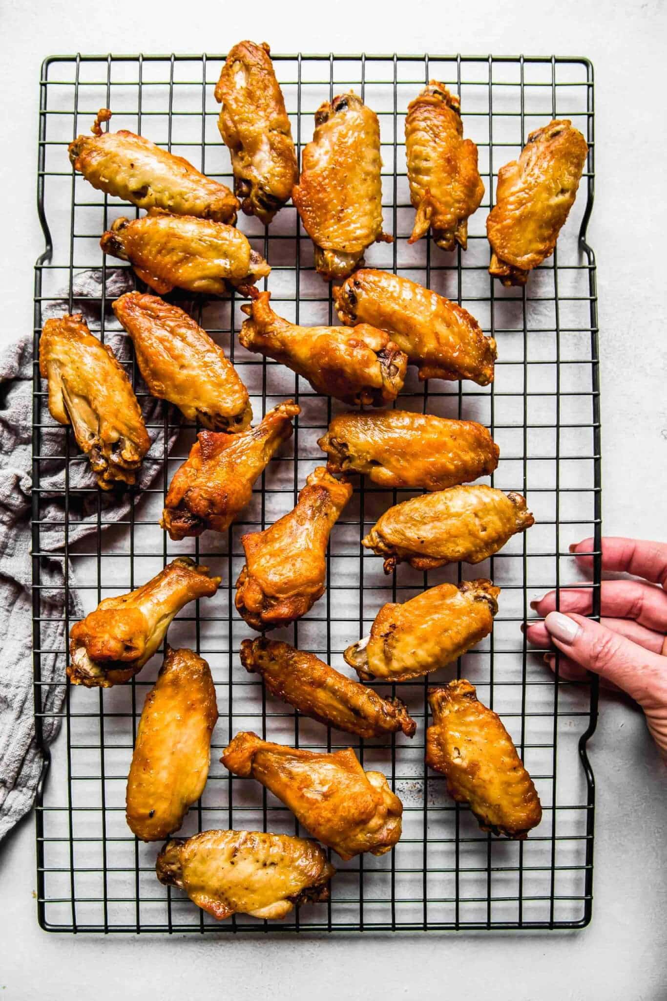 Air fryer wings on cooling rack.