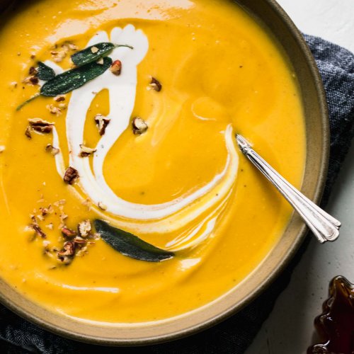 Overhead close up of bowl of butternut bisque.