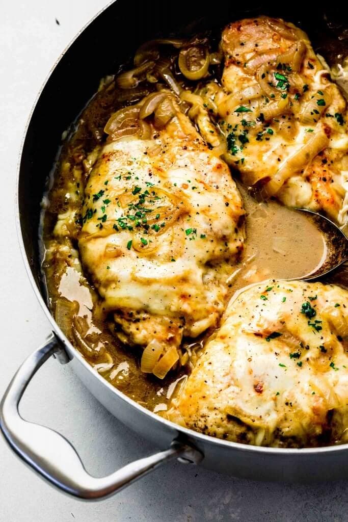 French Onion Chicken cooked in skillet and sprinkled with parsley