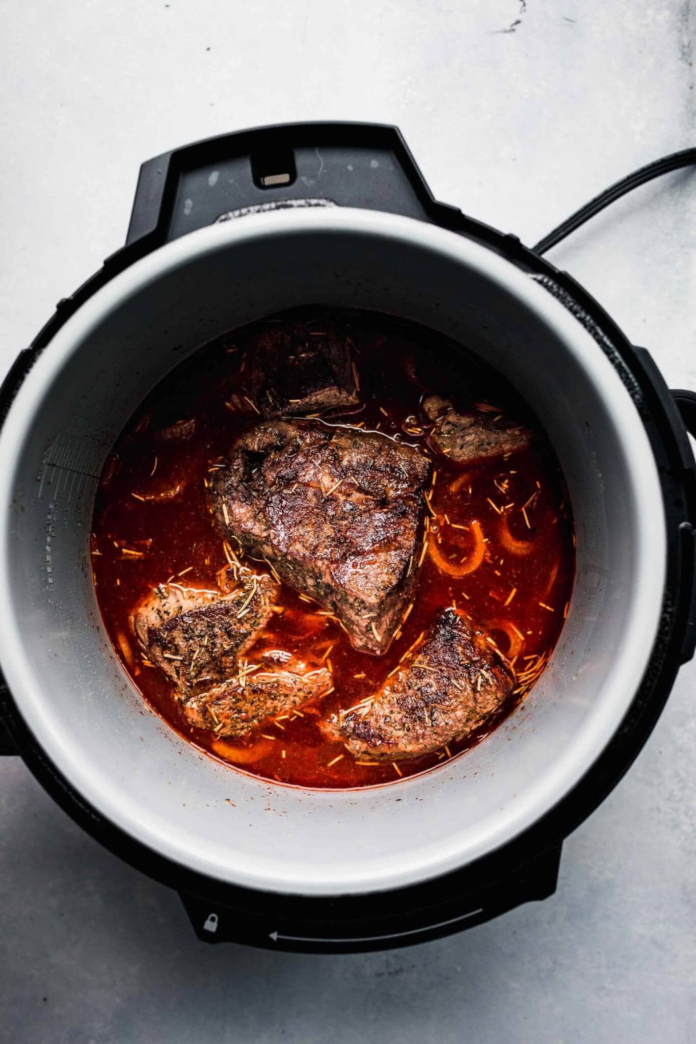 Seared meat added back into pot. 