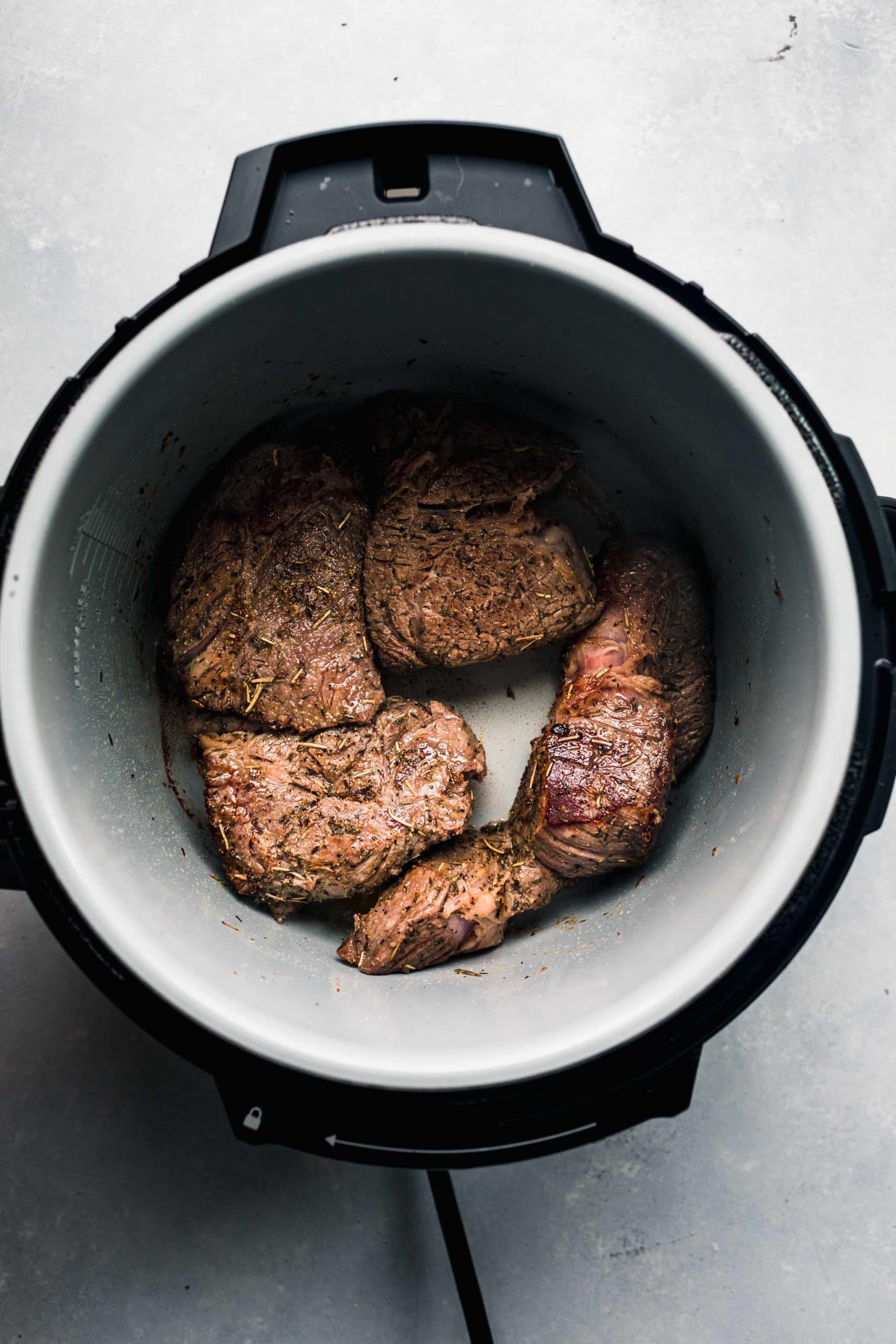 Chuck roast pieces browned in Instant Pot