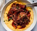short ribs and mashed potatoes in white bowl