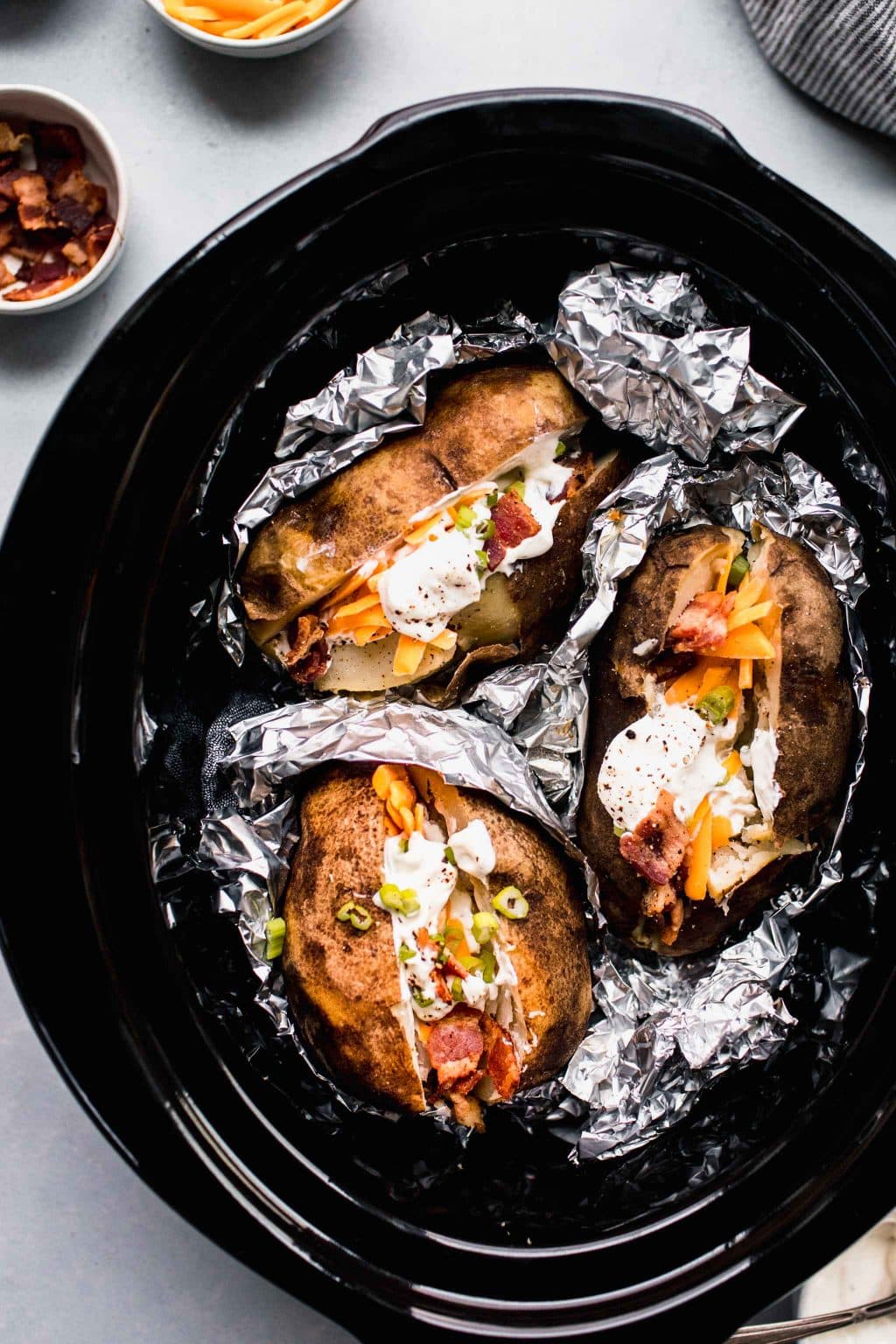 Slow Cooker Baked Potatoes Recipe (Easy + Fluffy)