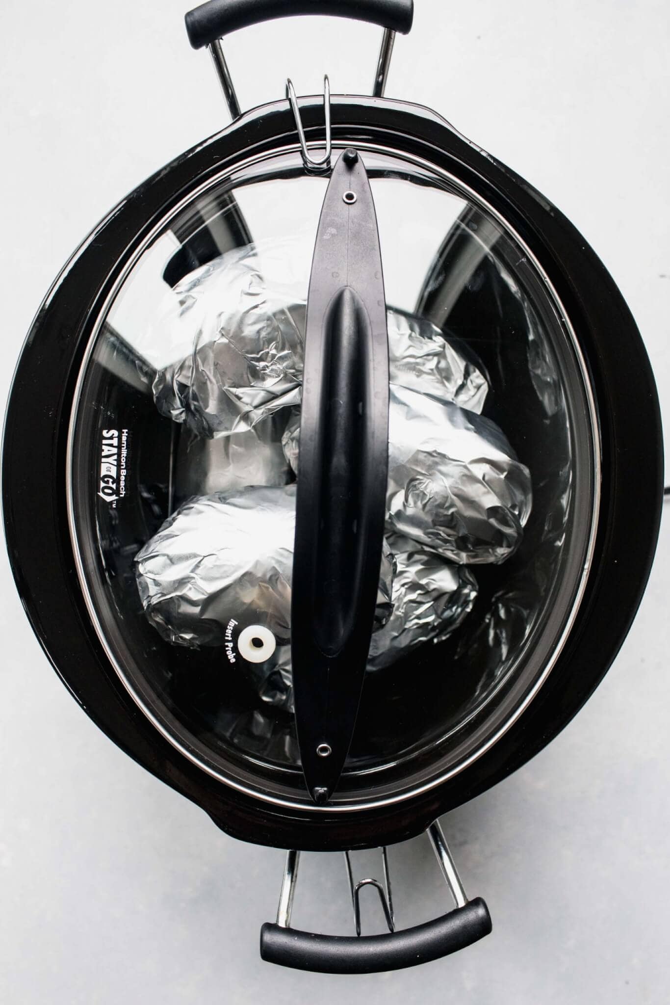 Slow Cooker Baked Potatoes Recipe (Easy + Fluffy)