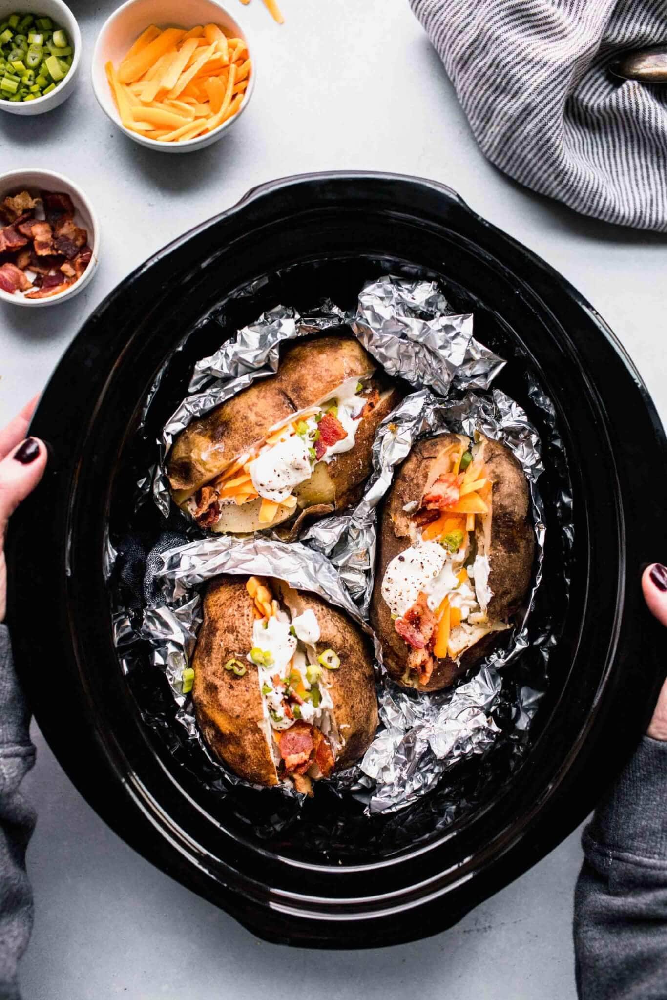Slow Cooker Baked Potatoes Recipe (Easy + Fluffy)